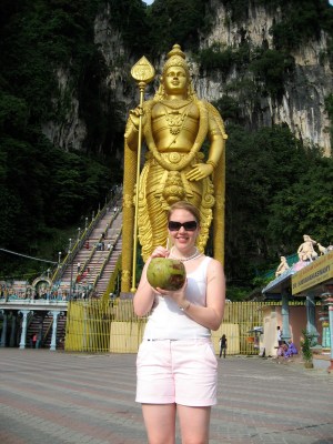 Me with my coconut in front of the God.