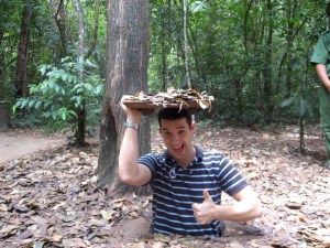 John in the tunnel.  Yes, he is standing on the ground.