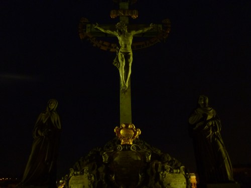 One of the many beautiful statues on the Charles Bridge