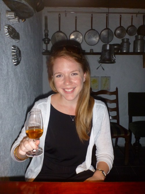 Trying the local dessert wine made from apples.