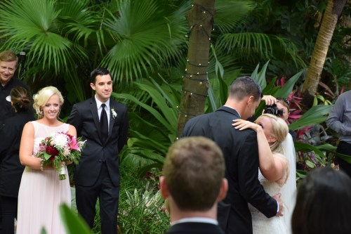 The first dance with brother and sister watching from the side
