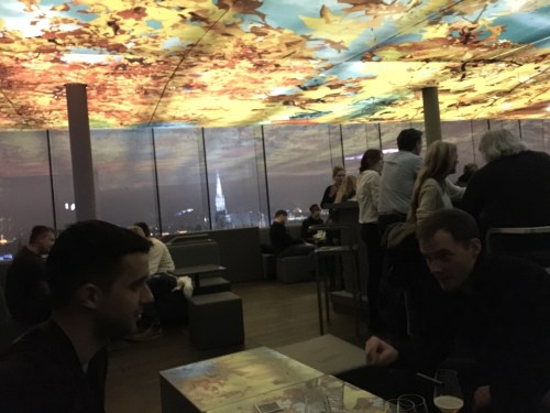 Chatting in the beautiful top-floor bar!